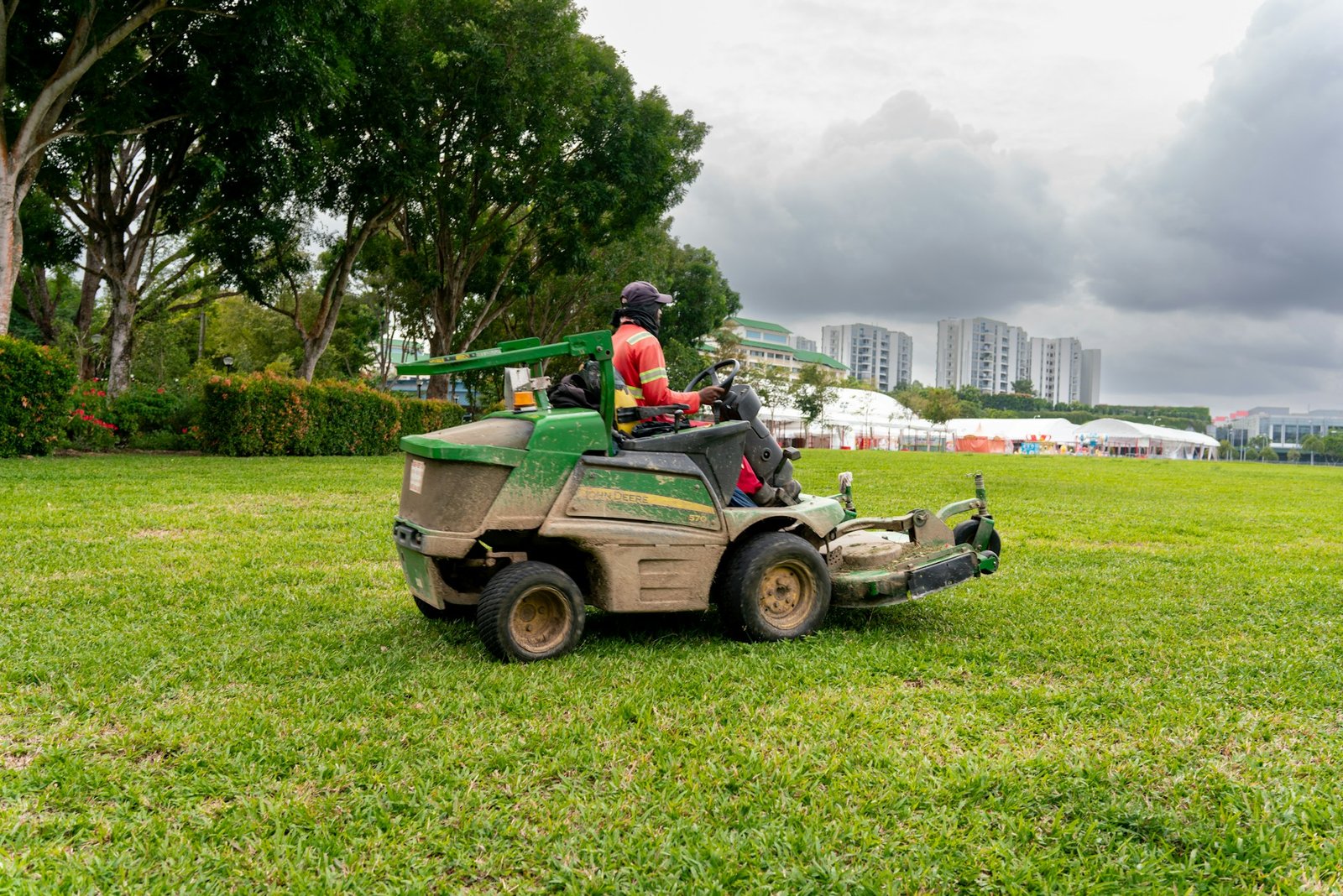 Commercial mower cutting a large open lawn